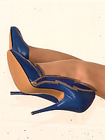 These are some beautiful blue high heel stilettos worn by a horny MILF blonde